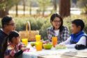 Campers-Eating-Together-700×467